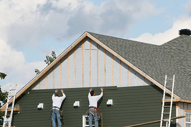 Professional Siding technician working in Morral, OH